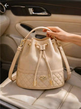 Cream signature Diamond Bucket bag