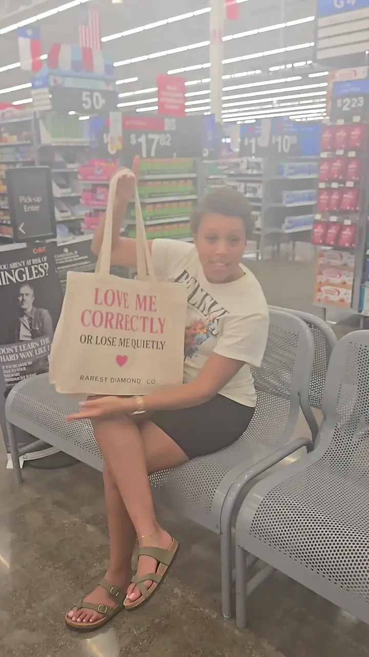 Original in-store scene showing the Love Me Correctly tote