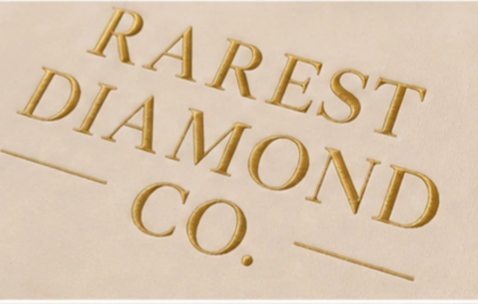 Close view of the gold Rarest Diamond Co. chest design on cream fabric