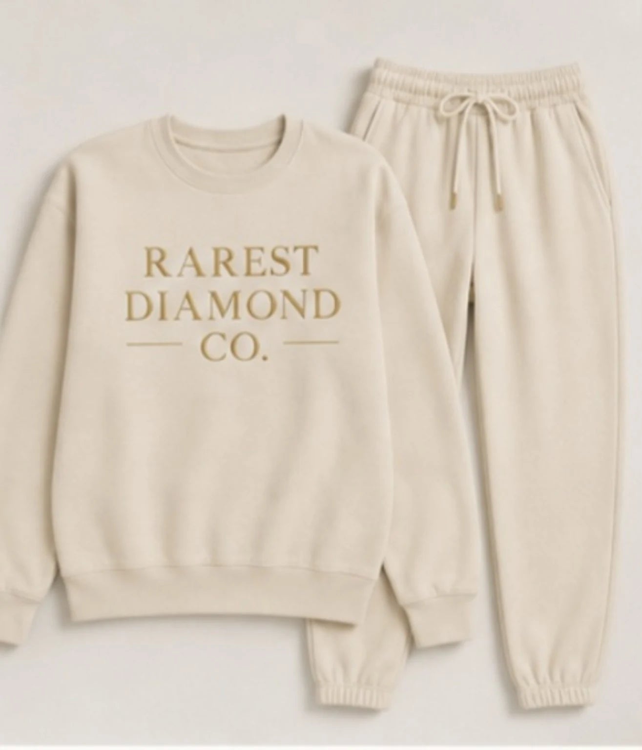 Cream Rarest Diamond® Co. crewneck sweatshirt and matching joggers laid flat