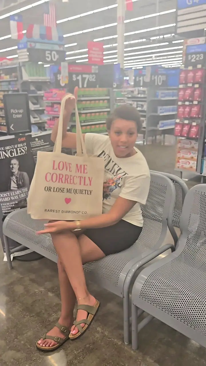 Original in-store scene showing the Love Me Correctly tote